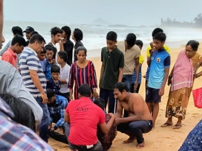 Youth swept away in the Arabian sea while immersing an idol rescued by coast guard personnel